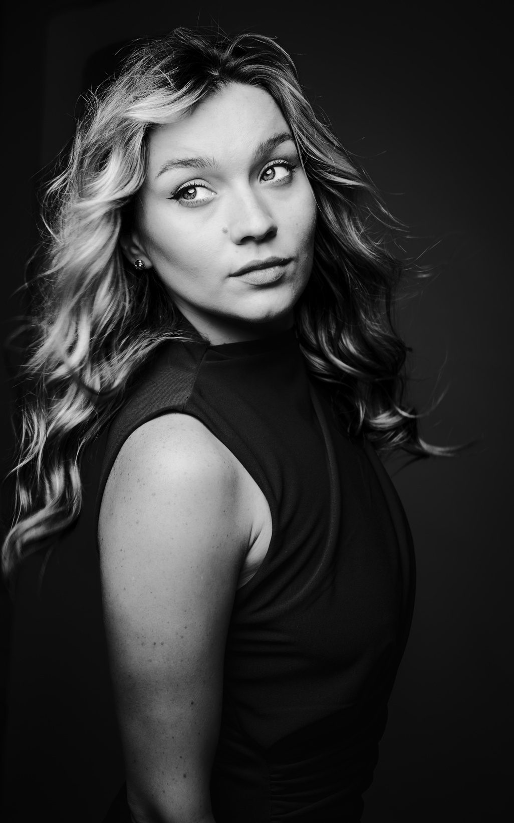 Black and white portrait with soft wavy hair